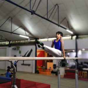 izzac on parallel bar